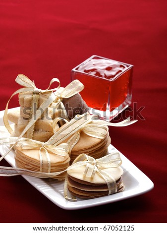 Biscuits tuiles cookies tied with ribbons as a special gift, the image isolated