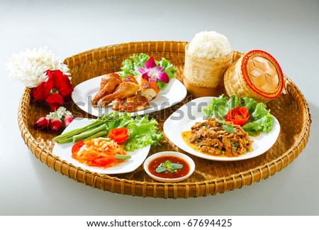 A bamboo tray of Northeast region Thai traditional food style isolated