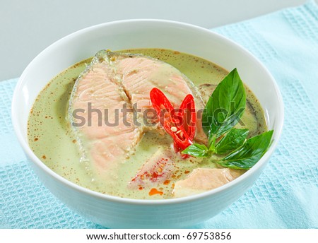 Salmon in concentrated green curry asian food style isolated