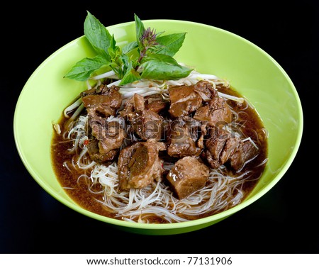 Noodle and casseroled beef with concentrated gravy one of Thai noodle menu isolated
