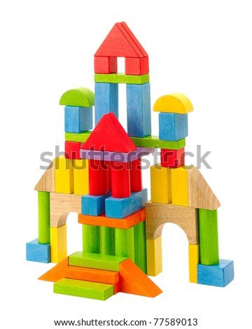 Colorful toy castle built from wood blocks, children can learn and play an image isolated on white