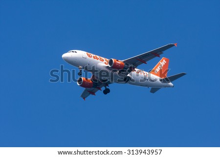 MADEIRA, PORTUGAL - MARCH 22, 2014:Easy Jet plane taking off from MADEIRA Funchal airport on a sunny day on March 22, 2014 in Madeira, Portugal.