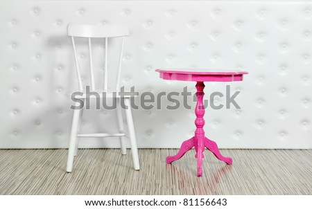 Purple chair and white table on a white background