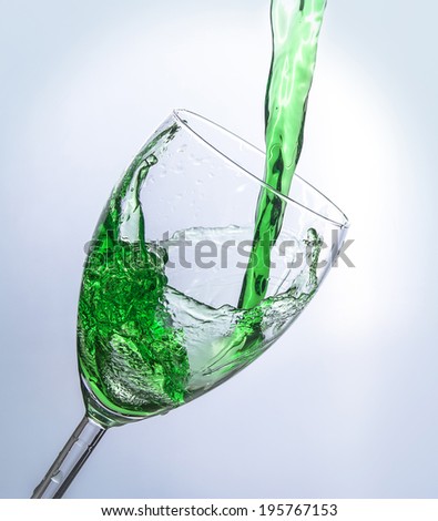 Beautiful splash of water in glass isolated on white