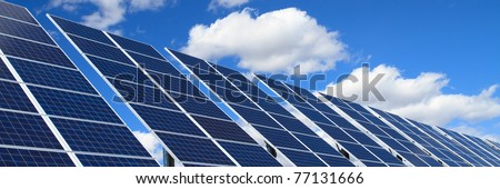 solar panels over blue sky