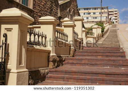 Long and steep pedestrian steps on the side of the road, leading up to the higher grounds of the city of Port Elizabeth
