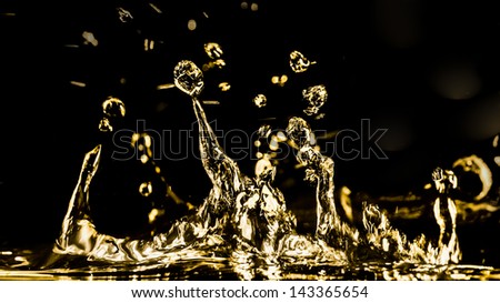 Fluid flames of splashing water and bubbles forming abstract figures