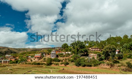 Malagasy homes build along the hills of  the central highlands of Madagascar