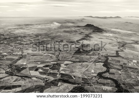Aerial view of the of the mountainous terrain in the outskirts of the city of Cape Town