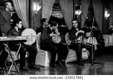 Cairo - Oct 2014: A band plays music for a dinner cruise and live performance show over the Nile River on Oct 14, 2014 in Cairo, Egypt