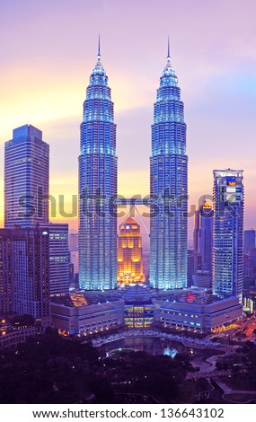 Kuala Lumpur, Malaysia - May 19: Petronas Twin Towers At Twilight On May 19, 2012 In Kuala Lumpur. Petronas Twin Towers Are Twin Skyscrapers And Were Tallest Buildings In The World From 1998 To 2004.