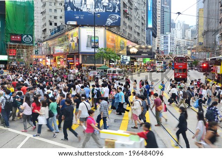 HONG KONG - MAY 17: Crowded market stalls in Ladies\' Market, Mong Kok are in Hong Kong on May 17, 2014. It stretches one-kilometre with over 100 stalls of clothing, accessories and souvenirs.
