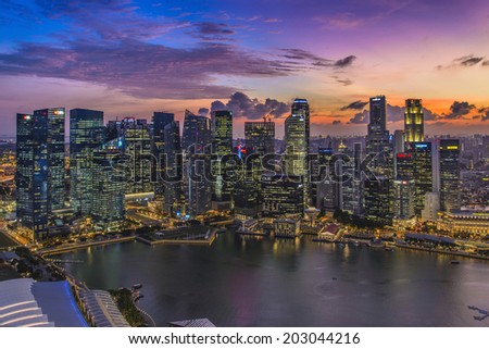 SINGAPORE - JUNE 25 : Singapore Skyline and Marina bay from the Sand Sky Park on June 25, 2014. Marina Bay is a bay near Central Area in the southern part of Singapore.
