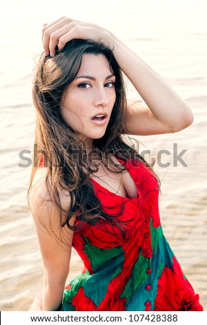 summer theme with a beautiful girl at the seaside