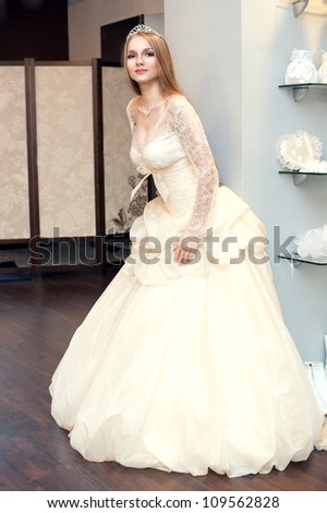 Beautiful blonde haired woman in bridal dress