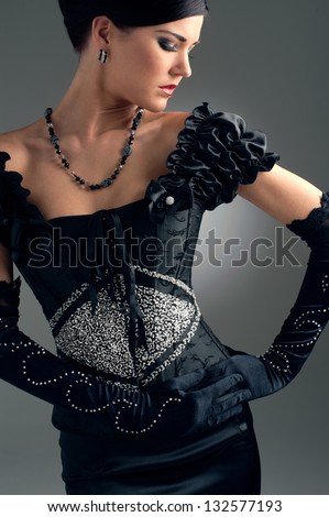 Girl in black evening beaded dress