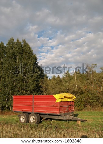 Storage trailer for the crop, at sunset