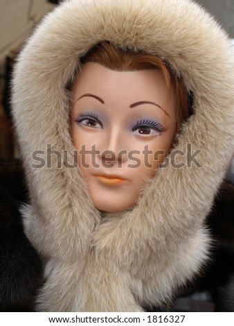 Woman cap from fox fur, close-up