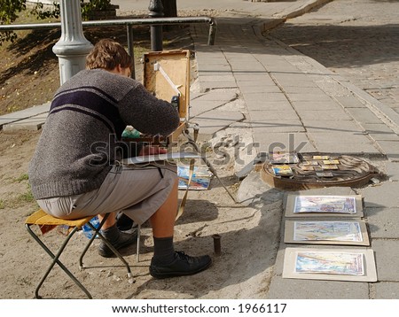 Street artist in action, view