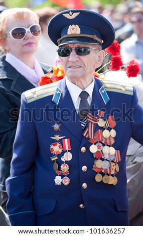 DONETSK, UKRAINE - MAY 9: Unidentified veterans at Victory Monument during the celebration of Victory Day on May 9, 2011 in Donetsk, Ukraine.