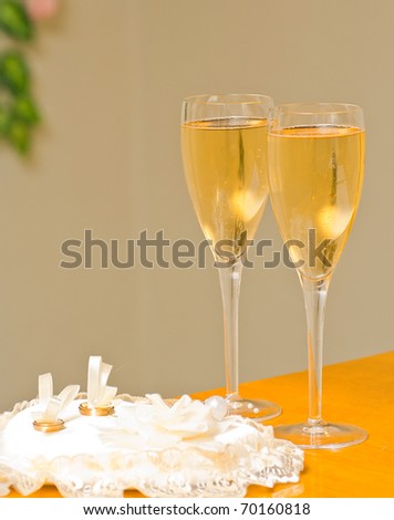 stock photo wedding champagne glasses and wedding rings