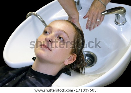 Washing of a head at the hair dresser