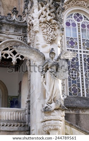 BUSSAKO, PORTUGAL - MAY 29, 2012: Sculpture of the goddess Nike guards the entrance to the Royal hunting palace