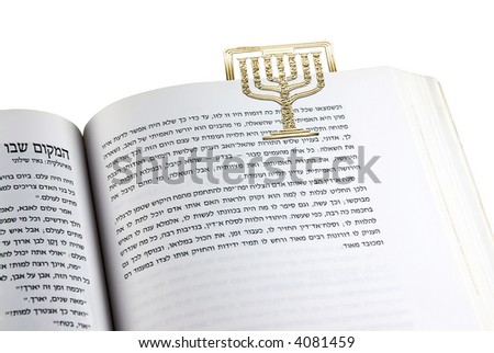 Hebrew text and a bookmark in the form of a menorah