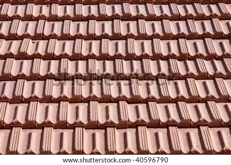 Part of the roof covered with a red tile