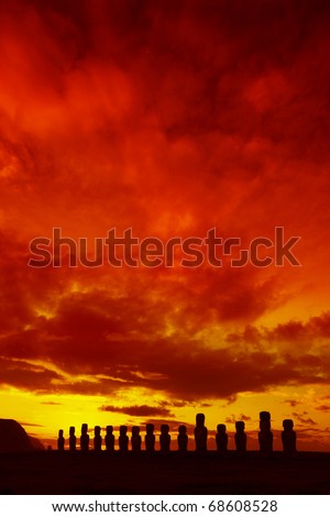 Easter Island statues against dramatic red sunset