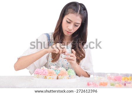 Young asia woman chef cooking cake  on white background