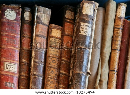 Row of old  books cover spines