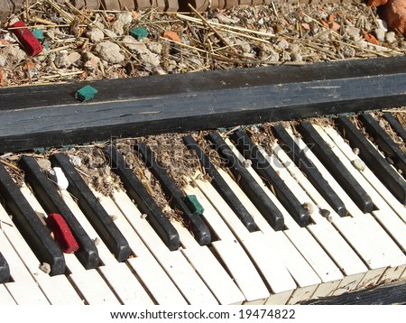 old broken obsolete piano keyboard