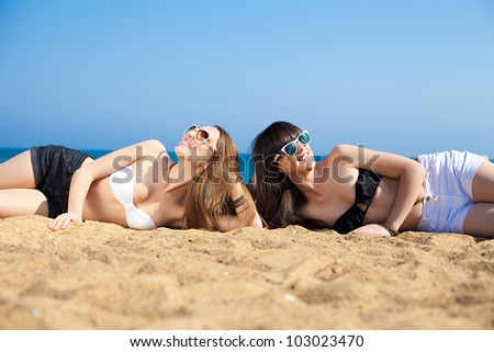 Young girls on vacation by the sea