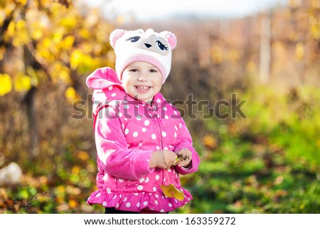 cute girl have fun in autumn vineyard