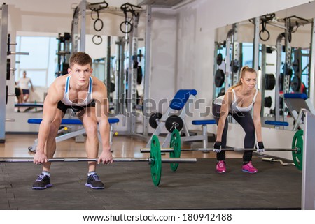 Gym man and woman push-up strength in a fitness workout