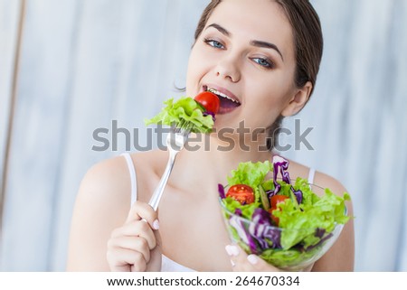 healthy lovely woman with salad