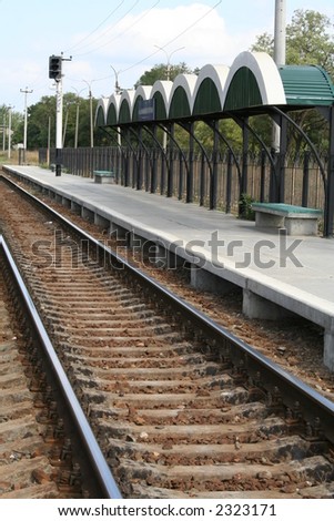 Railway station, rails, cross ties and a traffic light, (look similar images in my portfolio)