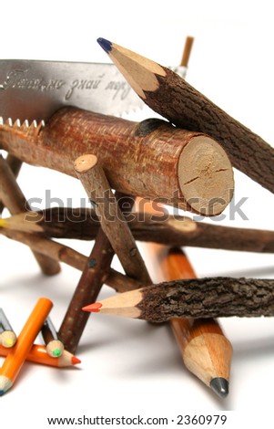 Three color pencils made of branches of a tree and three small under a saw and a log detailed