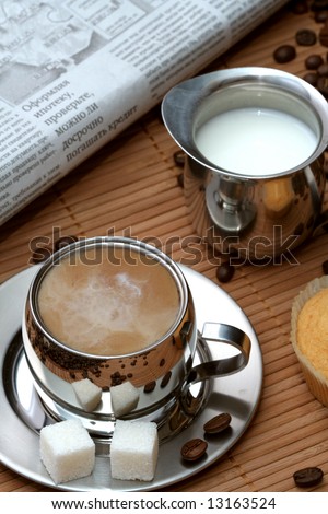 Cup of coffee with muffin and milk, coffee series