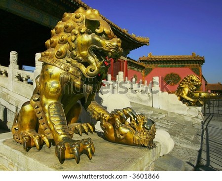 lion playing a beby - the sculpture to be in palace gugun. it is palace of the chinese emperor it to be in the centre of begin