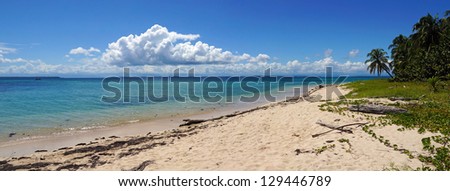 Panorama on an unspoiled beach with calm water in the Caribbean sea, Zapatilla island, Panama