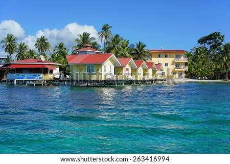 Tropical resort with cabin over water of the Caribbean sea, Carenero island, Bocas del toro, Panama, Central America