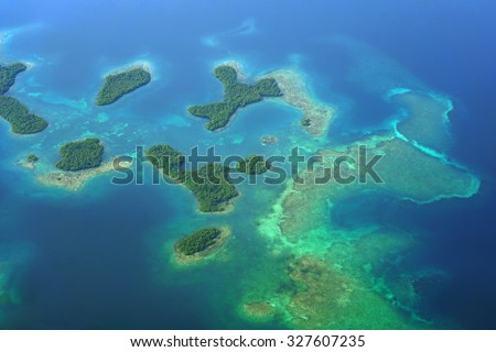 Aerial view of mangrove islands with shallow coral reefs in the archipelago of Bocas del Toro, Caribbean sea, Panama
