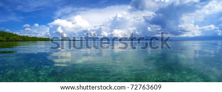 Panorama view with calm sea and cloudy sky in the archipelago of Bocas del Toro, Panama, Caribbean sea