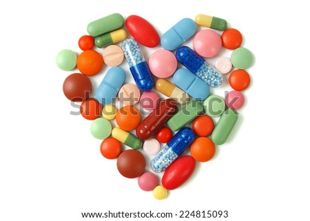 Heart shape made from pills and capsules