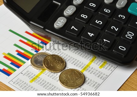 Macro of calculator, numbers and euro coins