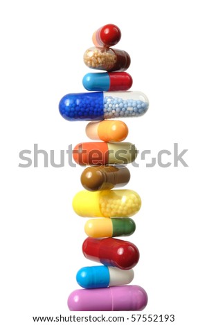 Stack of capsules isolated on white background