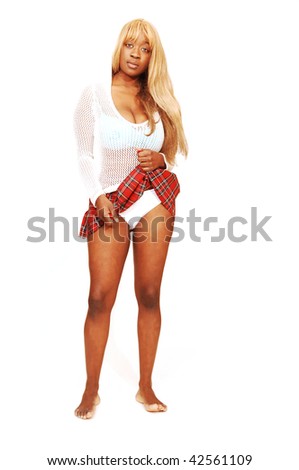 An young blond Jamaican girl lifting her red skirt, shooing the white panties and her nice legs for white background.