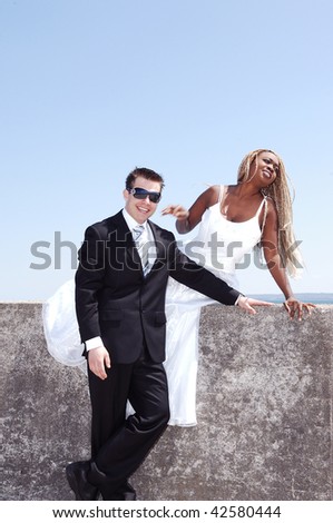 An young married couple on a photo shoot at the Hamilton harbor.